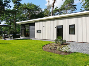 Modern chalet with a smart TV near forest